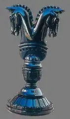 Knight chess piece carved as two heads