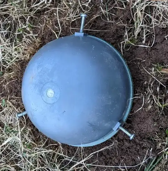 Sewer vent in yard with lid on