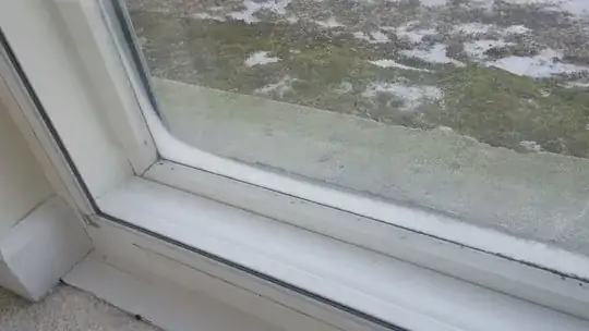 Gable end with thin shingle roof underneath