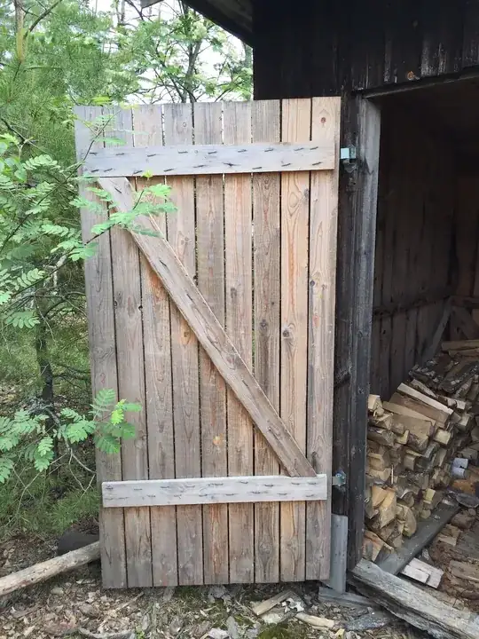 wood shed door with diagonal