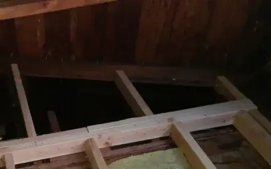 Wall tied to rafters