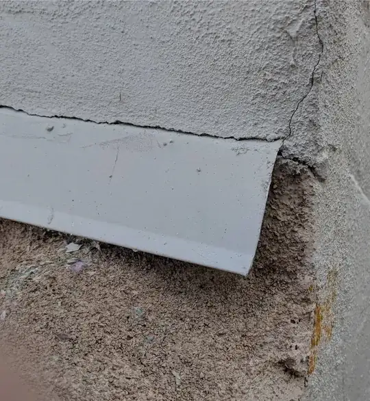 Stucco weep screed transition at corner over roof