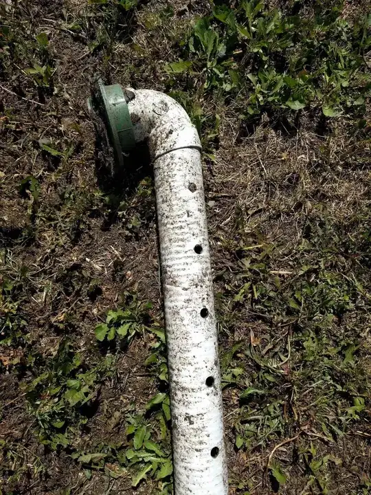 close up of pipe showing holes