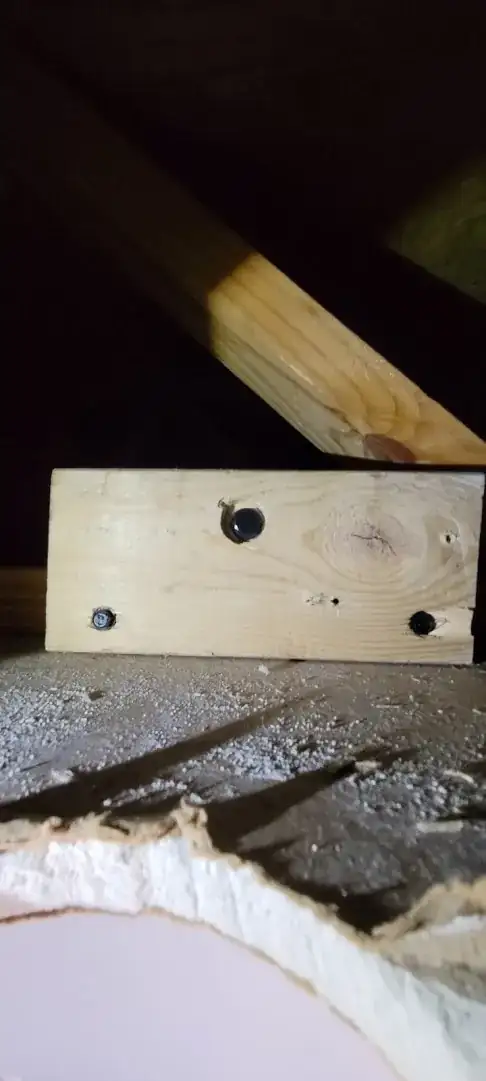 water spraying from inside the nozzle joint