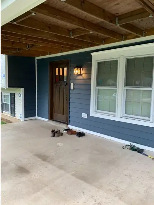 sink bowl with sizable chip taken out, showing inner plumbing beneath