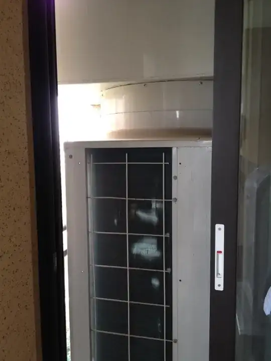 HVAC unit outside the balcony