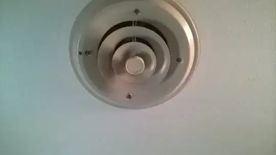 two drain lines connected to 3-way T with a studor vent connected to a metal drain pipe