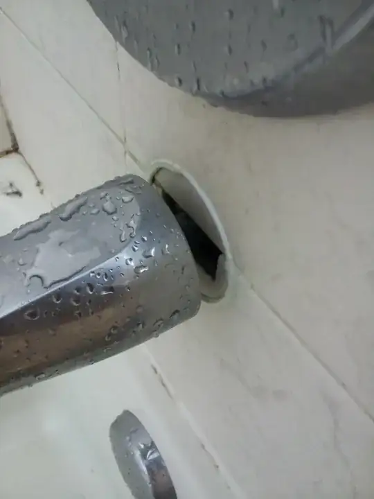 Gap between faucet and the wall