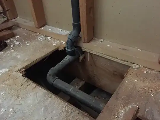 underside of pop-up receptacle with incorrectly labelled instructions