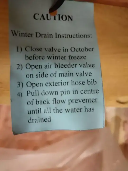 Tag hanging from a pipe