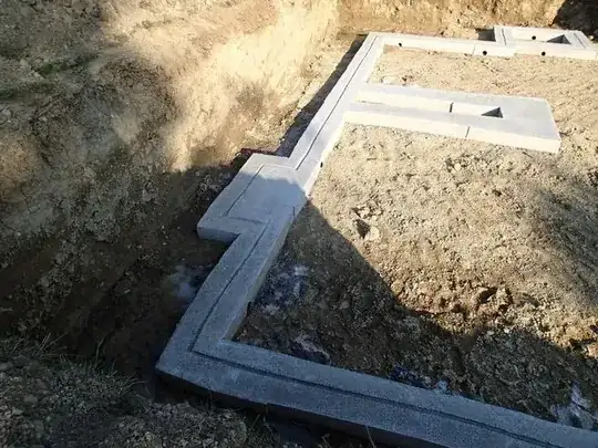 footer corner sitting in mud and water