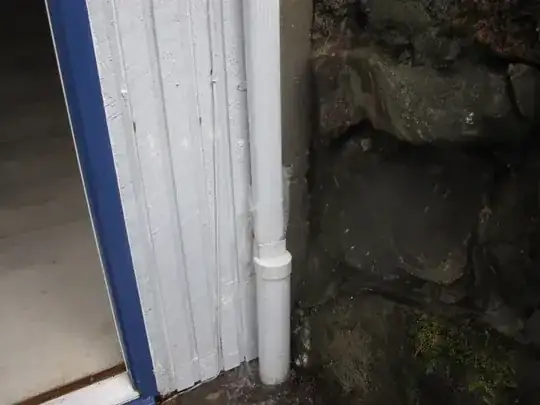 Water shooting up from downspout