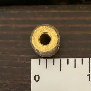 The brass spacer itself; top view.