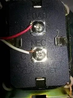 transformer face on the wall above the boiler