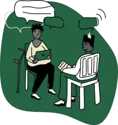 Two people talking to each other with laptops