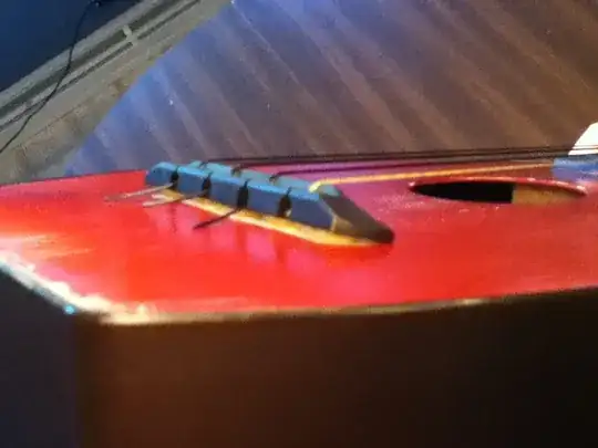 Flea ukulele with broken bridge, side view