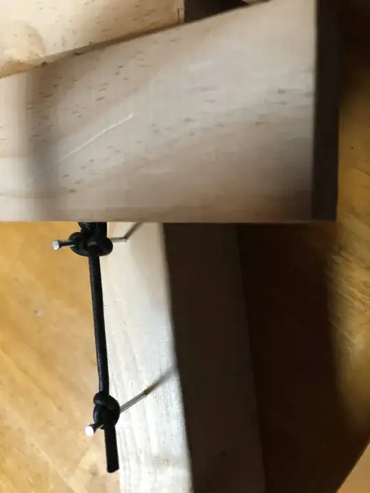 This is the 'bed' in which the xylophone rests. I bought the rubber at a hardware store. It's very basic, but sounds quite reasonable.