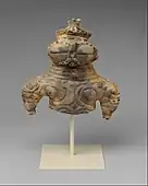 Dogū; 1000–300 BC; earthenware with cord-marked and incised decoration; height: 16.5&nbsp;cm, width: 16.2&nbsp;cm, depth: 7.9&nbsp;cm; Metropolitan Museum of Art (New York City)