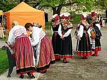 Image 31Estonian folk music performers dressed in traditional clothing (from Culture of Estonia)