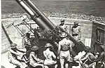 Gunners working on 3.7-inch (94&nbsp;mm) heavy anti-aircraft gun. 1943.