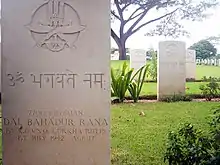 Tombstone for Gurkha soldier who served in British army, in Gurkha and English