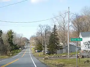 The hamlet of Adams Basin along CR&nbsp;212.