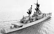 USS&nbsp;Belknap, a later example of a non-flush-deck ship, with the main deck giving way to a lower quarterdeck towards the stern