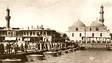 The Mosque's Minaret as seen on the left next to al-Asifyah Mosque, 1930.