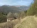 Mount Camiolo di Fondo, barn known as the Celi barn and Magasa in the background