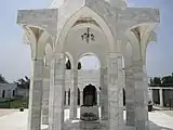 The memorial of Captain Raja Muhammad Sarwar Bhatti Shaheed (Nishah e Haider) at his tomb in GT Road near Mandra.