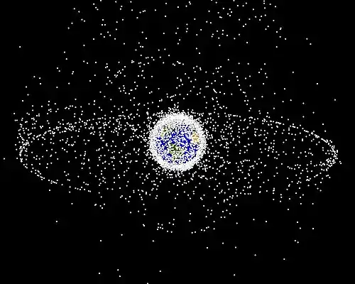 Image 53A computer-generated image mapping the prevalence of artificial satellites and space debris around Earth in geosynchronous and low Earth orbit (from Earth)