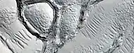 Close, color view of fractured ground, as seen by HiRISE under HiWish program