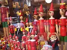 Pinocchio puppets in a shop window in Florence.
