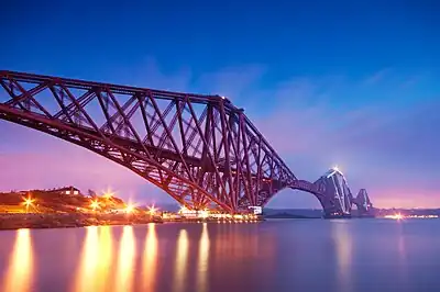 Image 12The Forth Bridge is a cantilever railway bridge over the Firth of Forth. It was opened on 4 March 1890, and spans a total length of 2,528.7 metres (8,296&nbsp;ft). It is often called the  Forth Rail Bridge or Forth Railway Bridge to distinguish it from the Forth Road Bridge.Photo credit: George Gastin