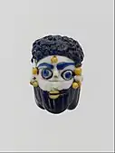 Face bead; mid-4th–3rd century BC; glass; height: 2.7&nbsp; cm; Metropolitan Museum of Art