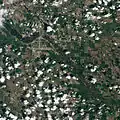 Natural-colour satellite image of Minot taken just as the River Souris reached its historic crest.