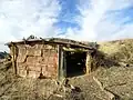 Kipp homestead – stable,  dugout of bank going down to river from cabins.