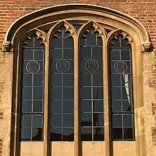 Tudor-style hood mould ending in decorative label stops, Magdalene College, Cambridge