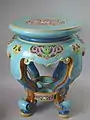 Garden Seat, 1870, 20 ins., coloured glazes, Revivalist motifs.