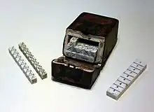 Image 51An ivory set of Napier's Bones, an early calculating device invented by John Napier (from Scientific Revolution)