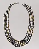 Sumerian necklace beads; 2600–2500 BC; gold and lapis lazuli; length: 54&nbsp;cm; Metropolitan Museum of Art