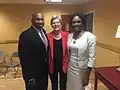 Holmes and his wife with U.S. Senator Elizabeth Warren