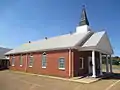 The First Baptist Church of Castor is located adjacent to the public school complex.