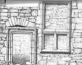 Window and armorial panelling over the entrance doorway