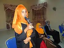 Image 33Somali woman in Hargeisa opening speech with traditional greeting. (from Culture of Somalia)