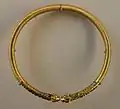 Achaemenid torc from Persia, c. 350&nbsp;BC, Susa, with ribbed hoop, animal head terminals, and stone inlays, from the Acropole Tomb