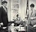 U.S. President Jimmy Carter (center) with Ted Kennedy (left) and Paul Tsongas signs the creation of Lowell National Historical Park, 1978