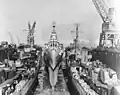 USS Claxton (DD-571), USS Canberra (CA-70) and USS Killen (DD-593) in floating dry dock ABSD-2 on 2 December 1944