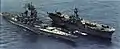 USS Guadalcanal alongside USS Iowa (BB-61) underway in 1987.