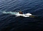 Miami surfaces in the North Arabian Sea during an anti-submarine warfare exercise with the Enterprise Carrier Strike Group. (11 November 2007)